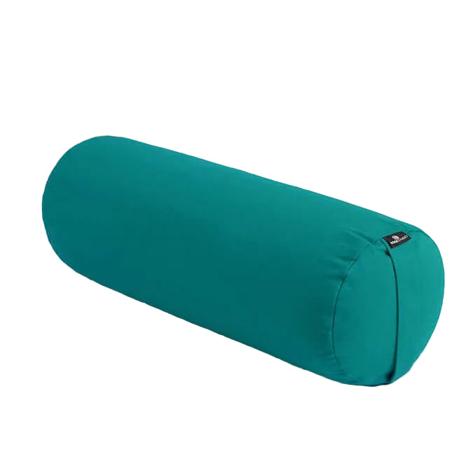Teal yoga bolster on a light gray background
