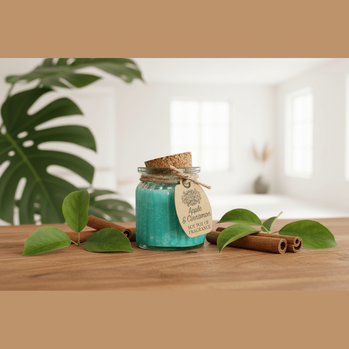 Turquoise candle in a glass jar with a cork lid on a wooden surface, surrounded by cinnamon sticks and leaves.