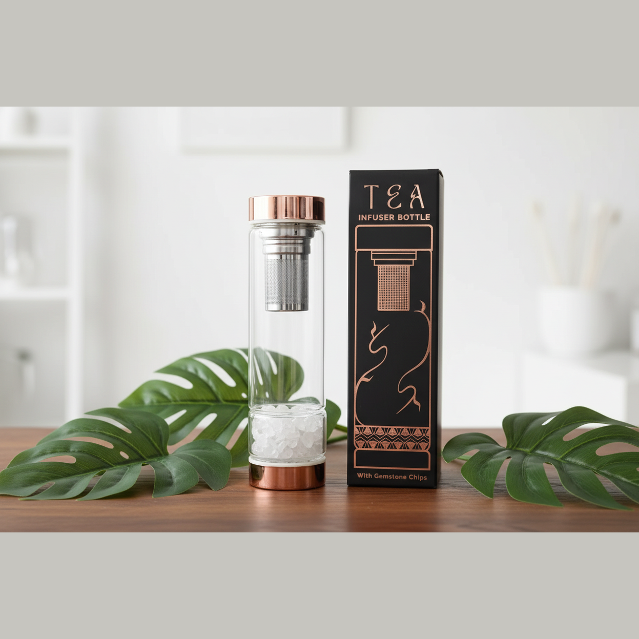 Tea infuser bottle with packaging on a wooden surface with leaves.