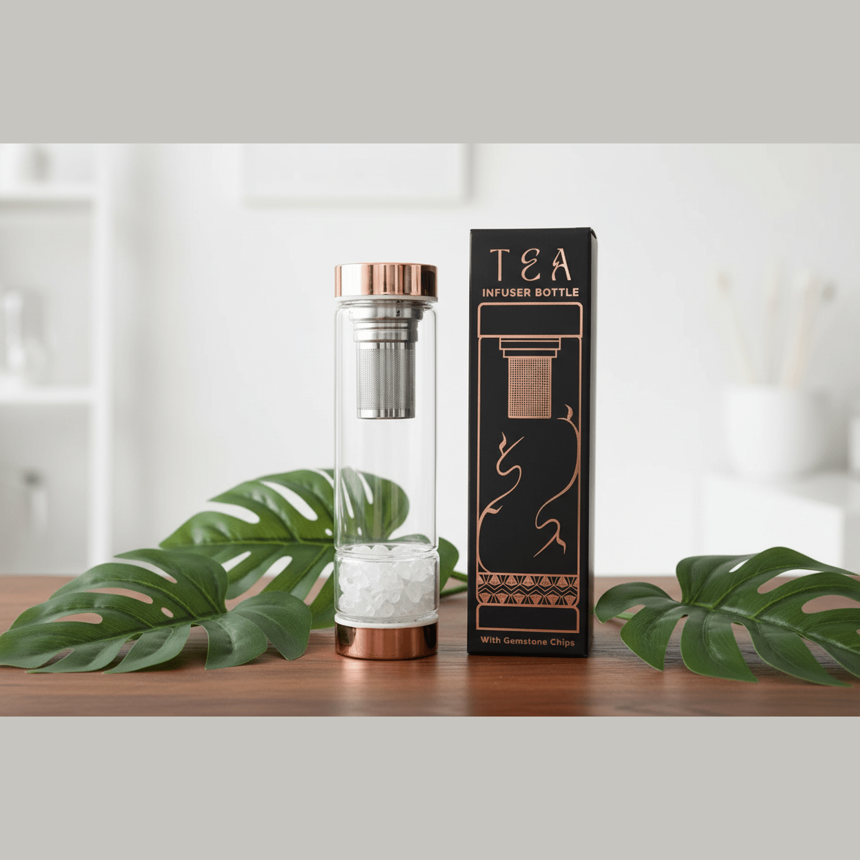 Tea infuser bottle with packaging on a wooden surface with leaves.