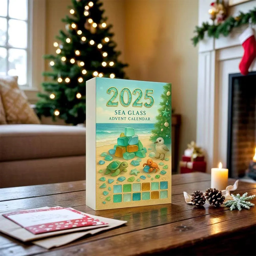 2025 Sea Glass Advent Calendar on a table with Christmas decorations in the background
