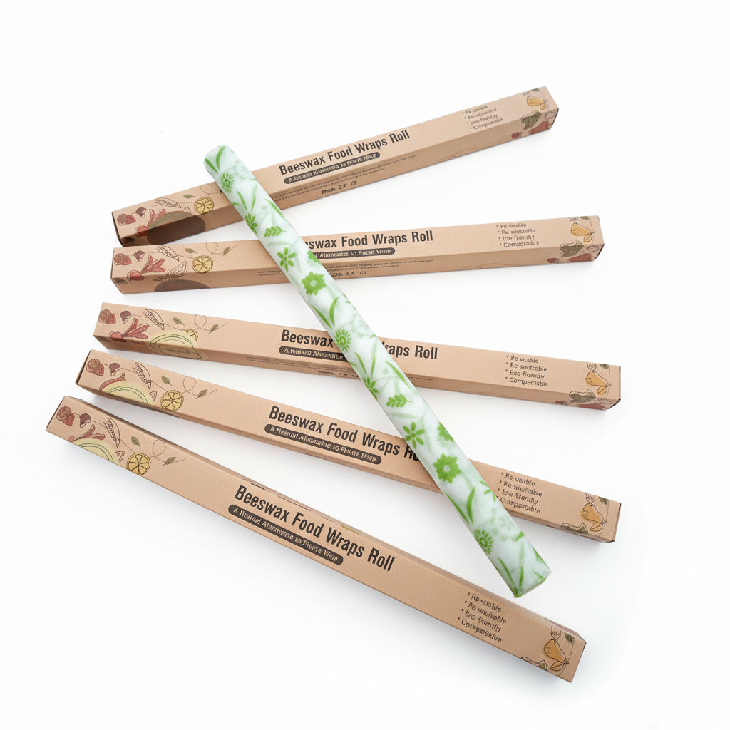 Rolls of beeswax food wraps on a wooden surface