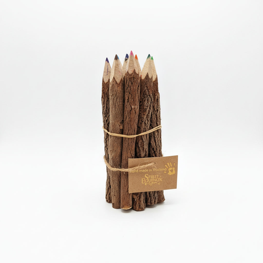 Set of wooden pencils tied together with a tag on a white background
