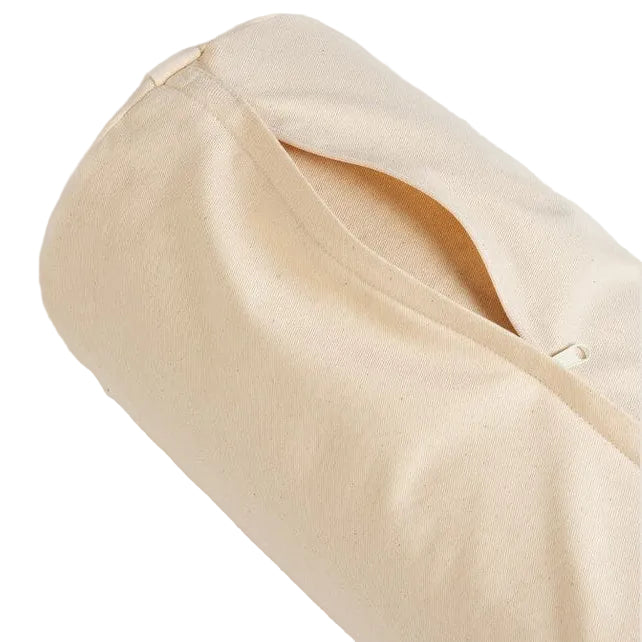 Beige yoga bolster with a removable cover on a light beige background