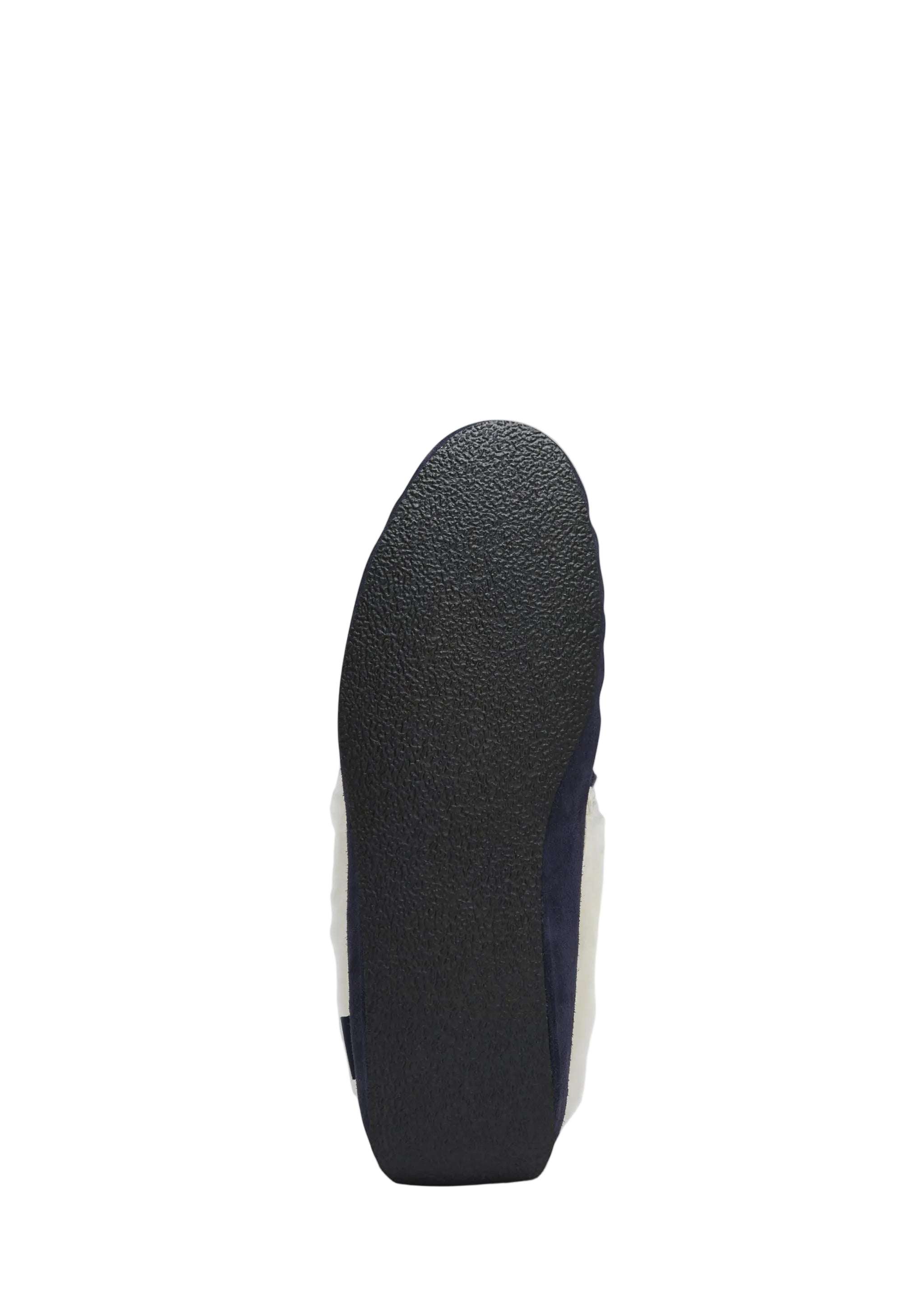 Black sole of a shoe on a light gray background