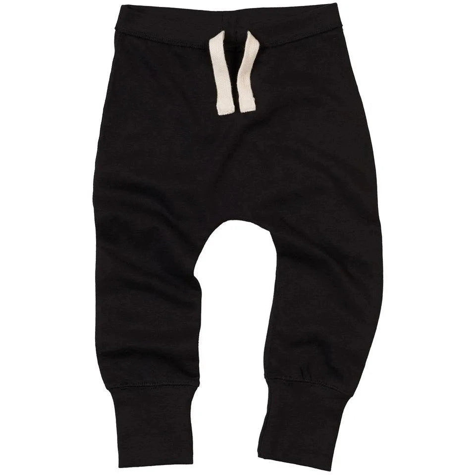 Black baby pants with white drawstring on a white background