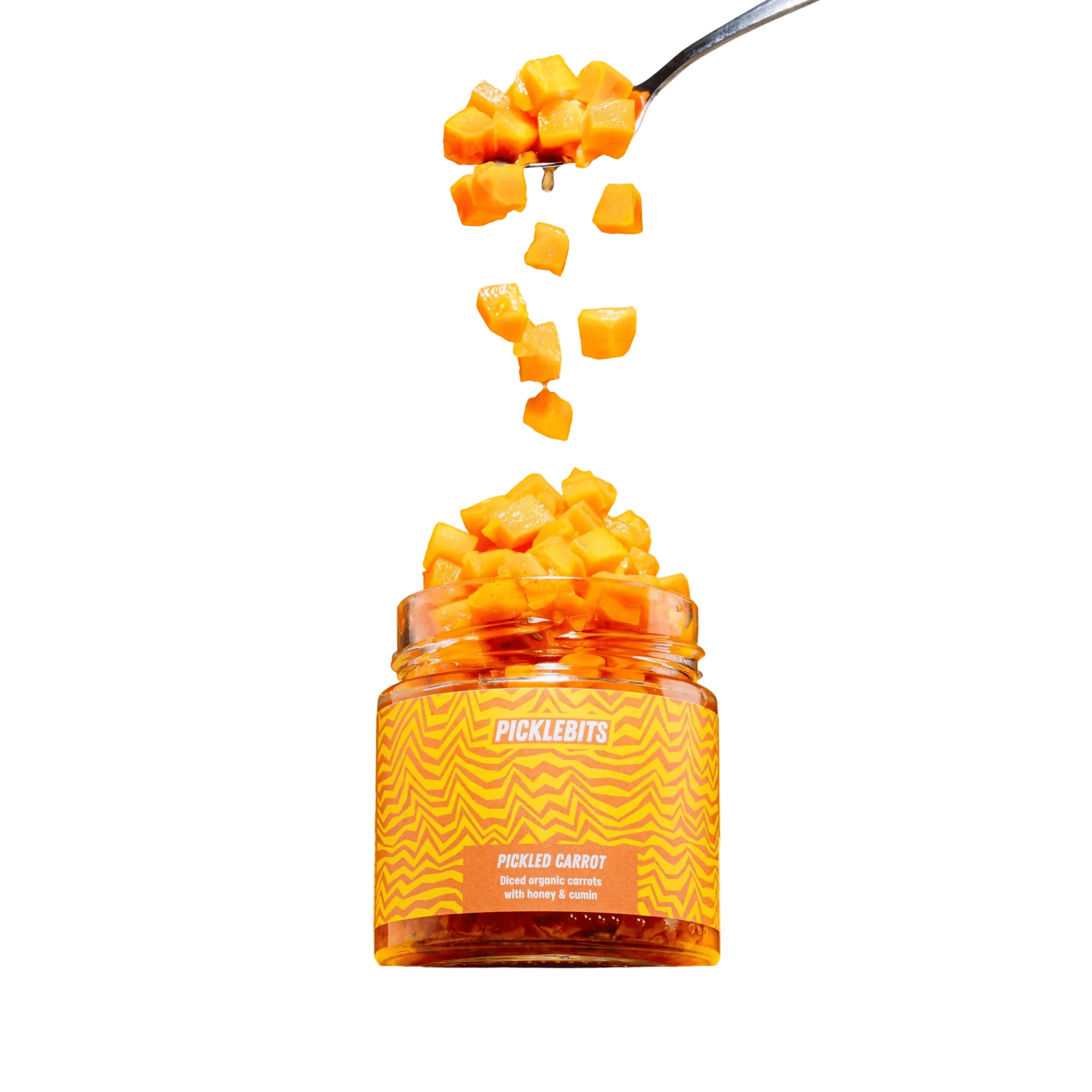 Jar of Picklebits with a spoonful being poured over it on a white background