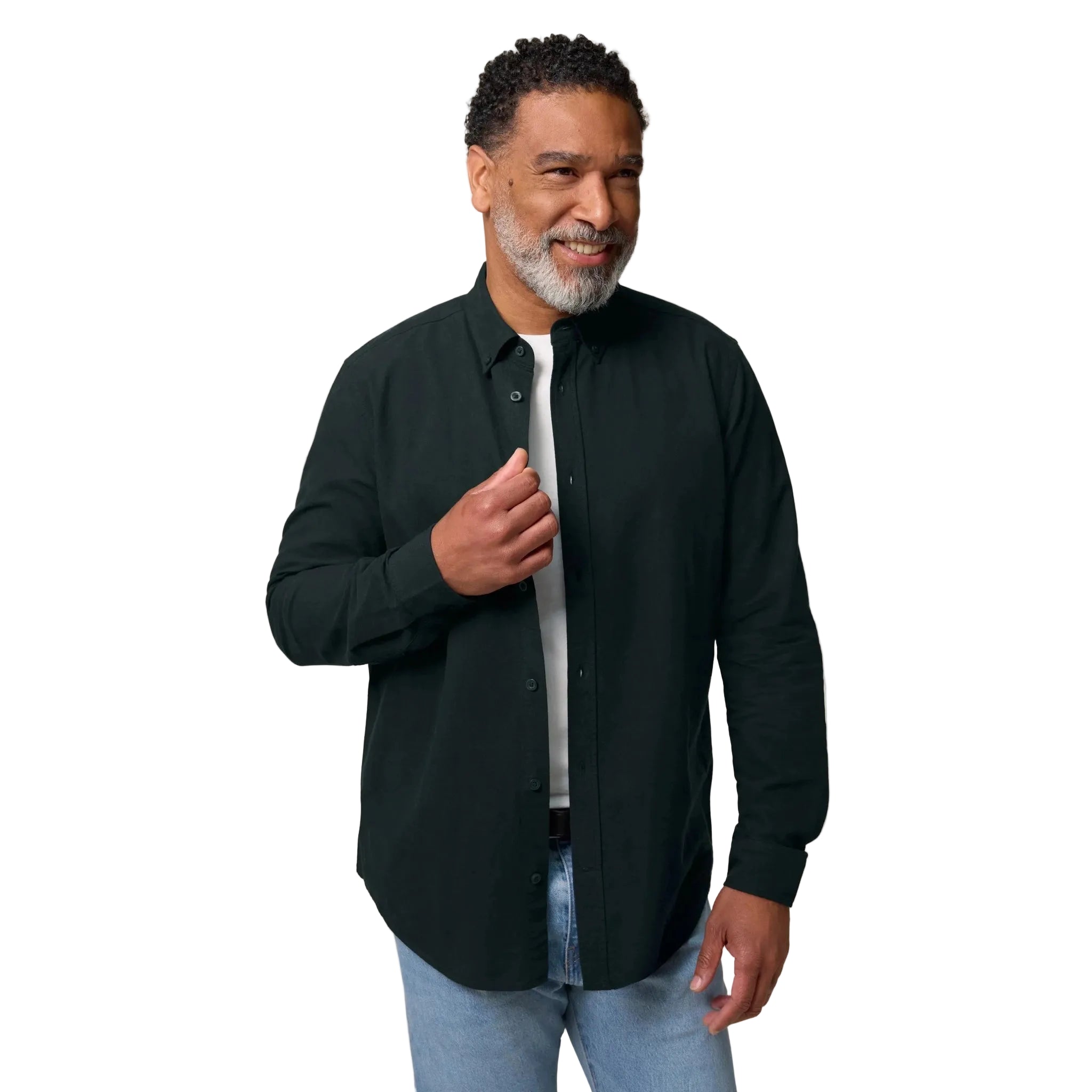 Man wearing a black long sleeve shirt and blue jeans on a white background