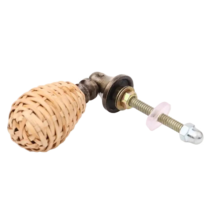 Decorative door handle with wicker finish and metal mechanism on a white background