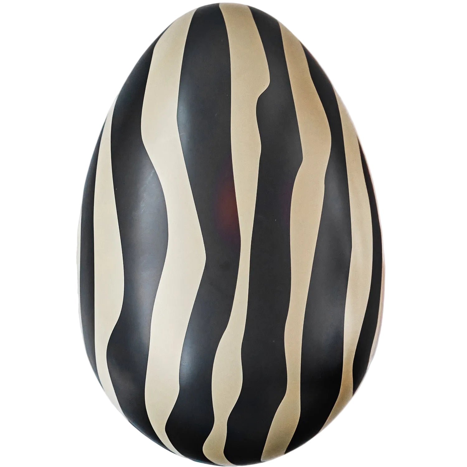 Refillable Easter Egg with black and beige wavy stripes on a white background