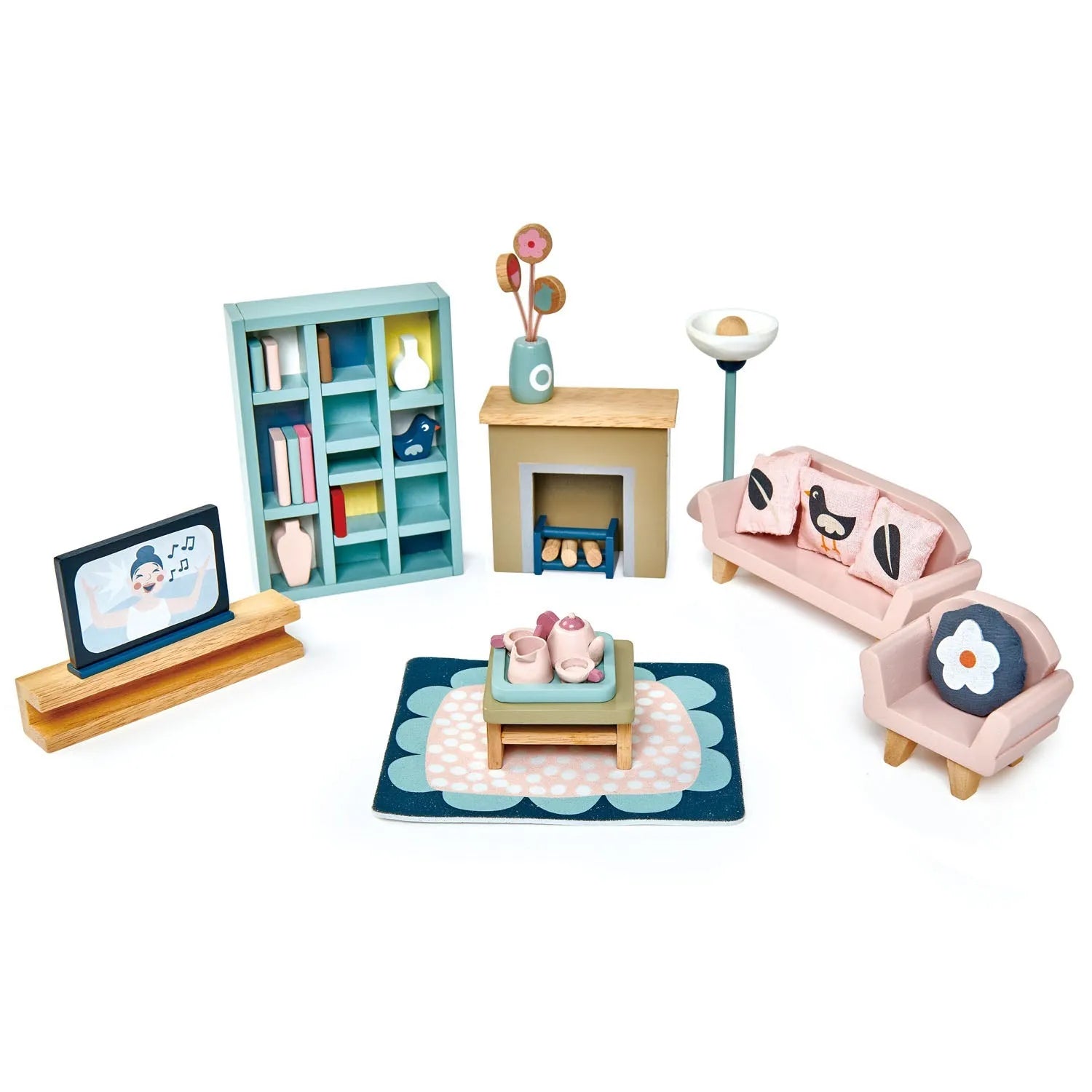 Set of toy dollhouse furniture, including a sofa, bookshelf, and table on a white background