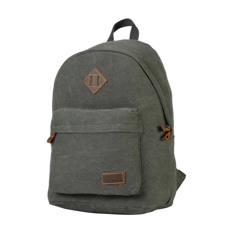 An olive green canvas backpack with brown leather accents, including a diamond-shaped logo patch on the front and a small brand label on the pocket, shown against a plain white background.