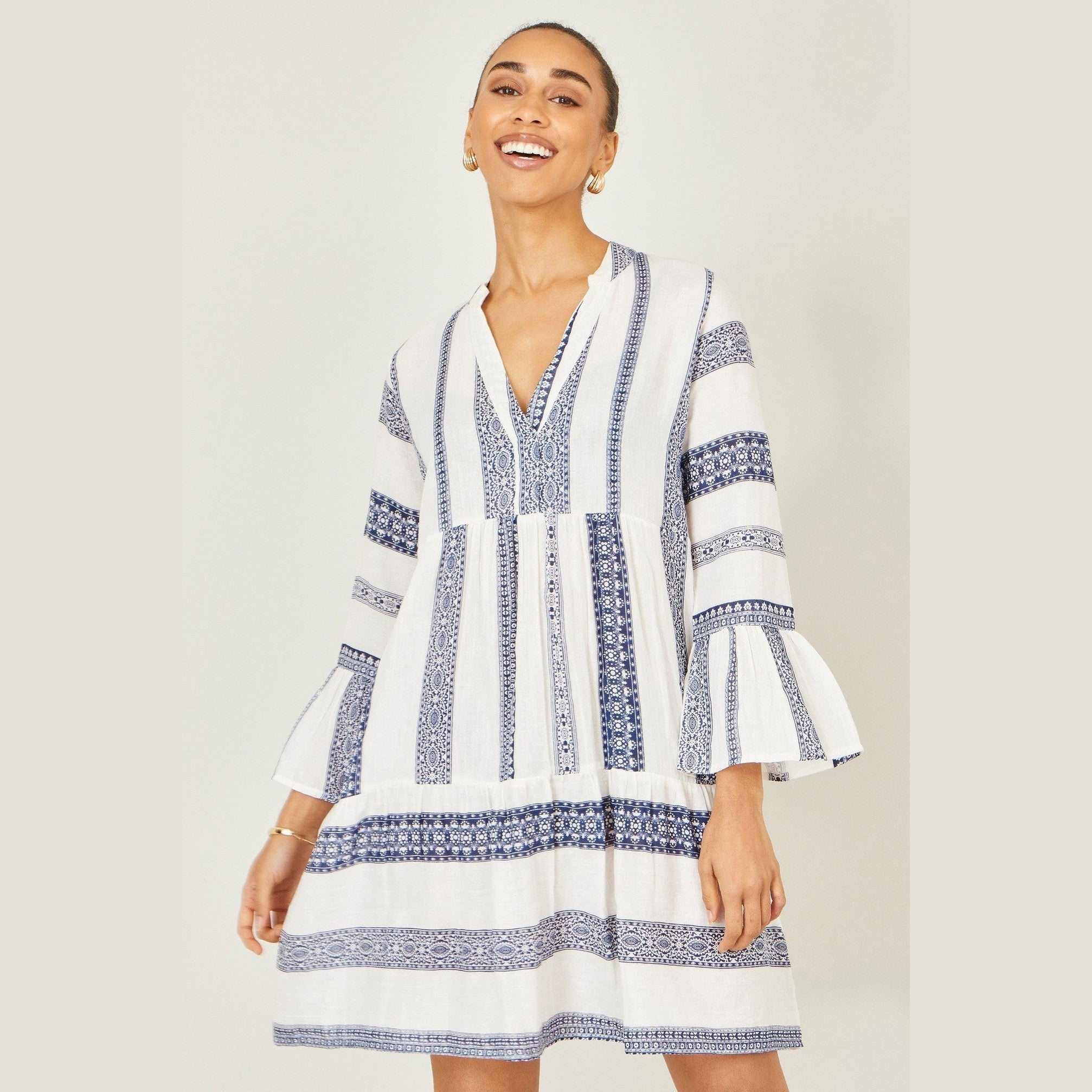 blue and white tunic dress