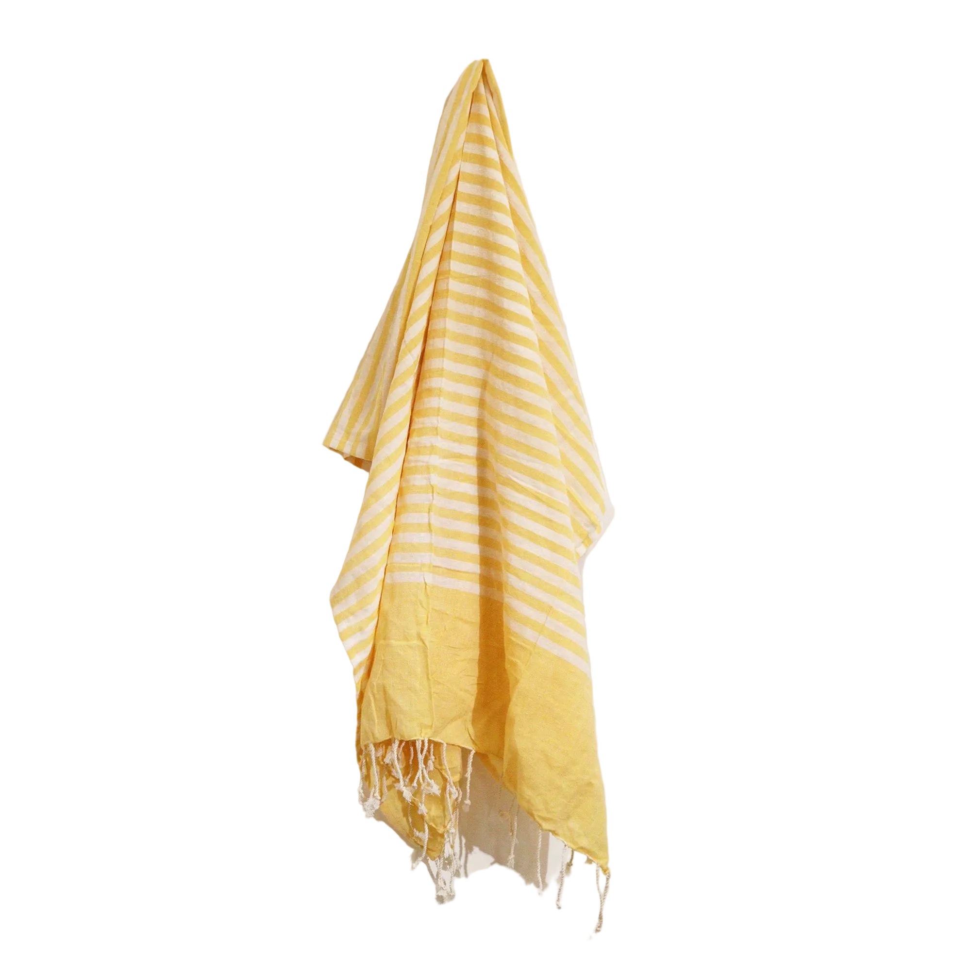 Yellow and white striped towel with fringes on a light background