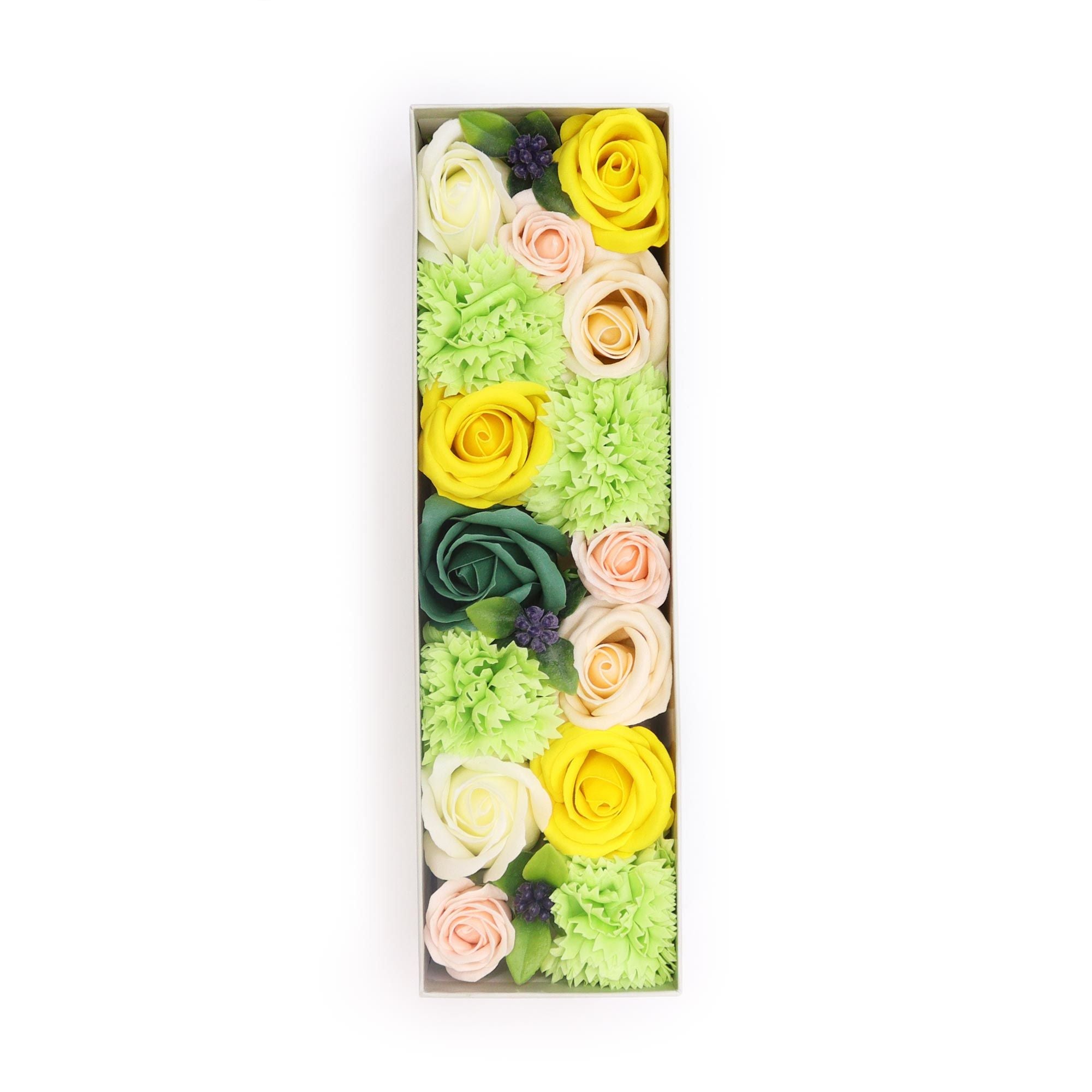 Colorful floral arrangement in a box on a white background