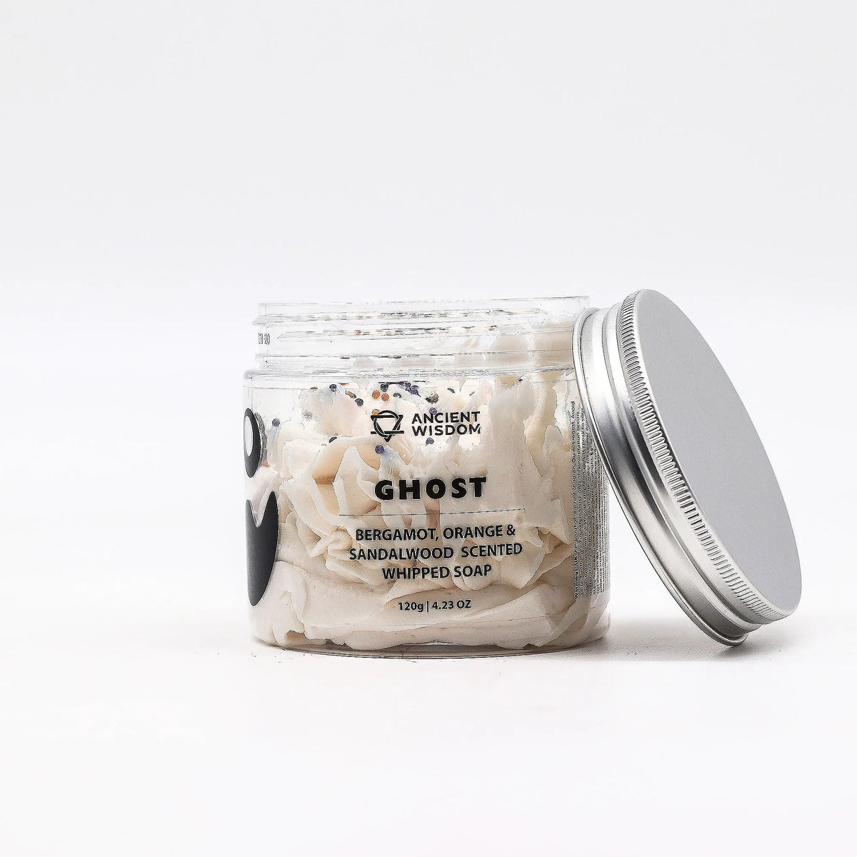 Jar of 'Ghost' whipped soap with a white label on a white background