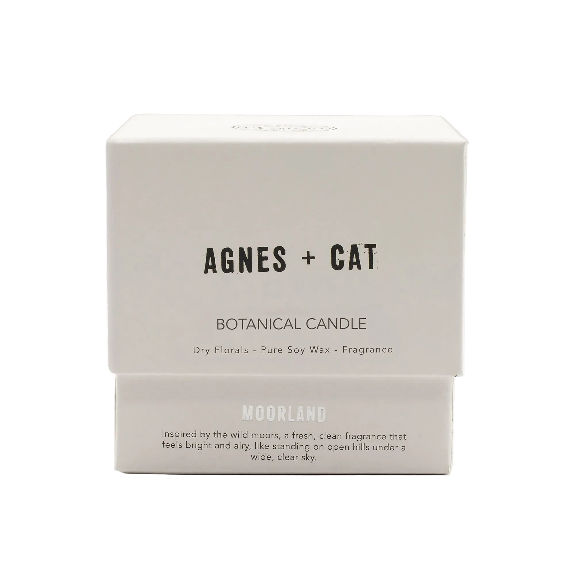 Boxed botanical candle by Agnes + Cat on a white background