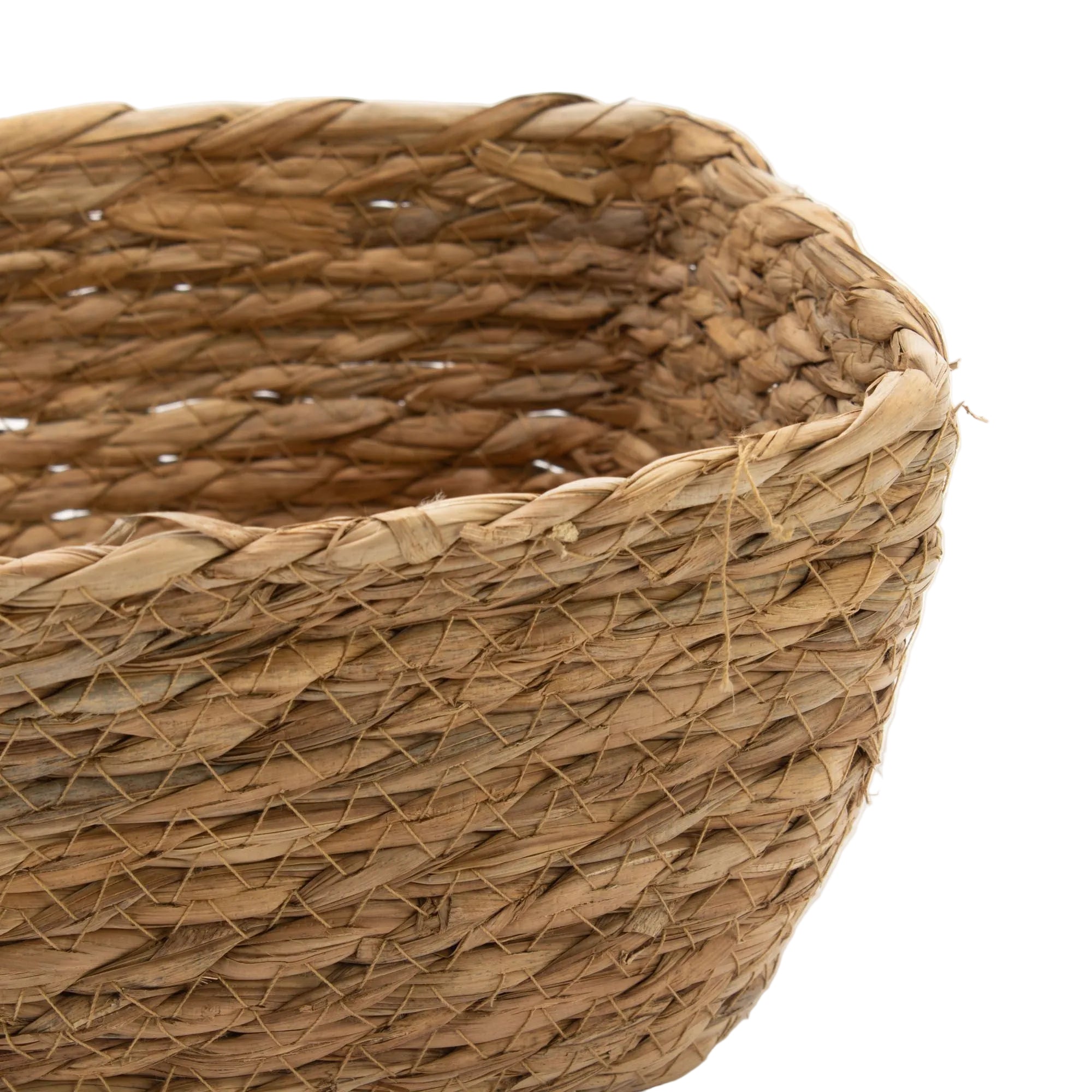 Close-up of a woven basket with a white background