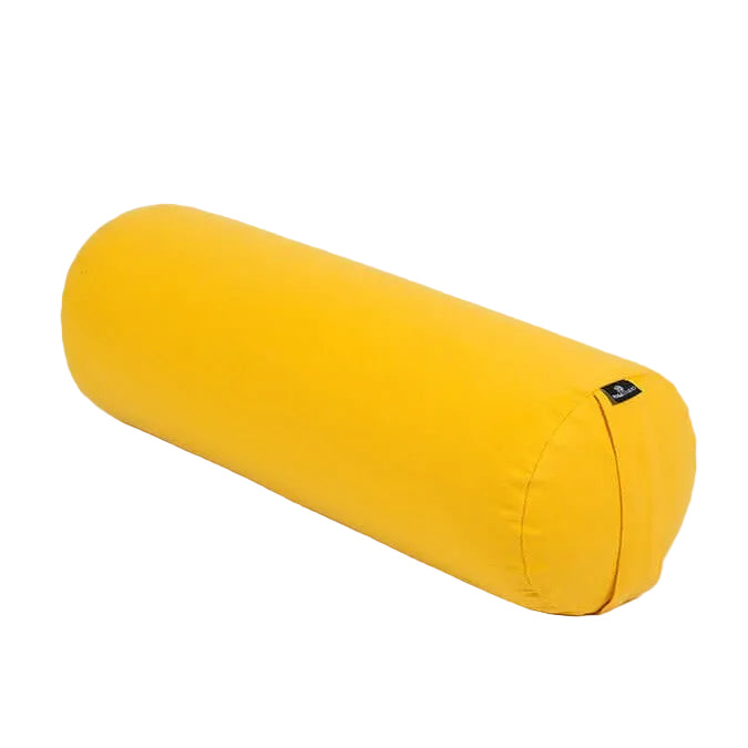 Yellow yoga bolster on a light gray background
