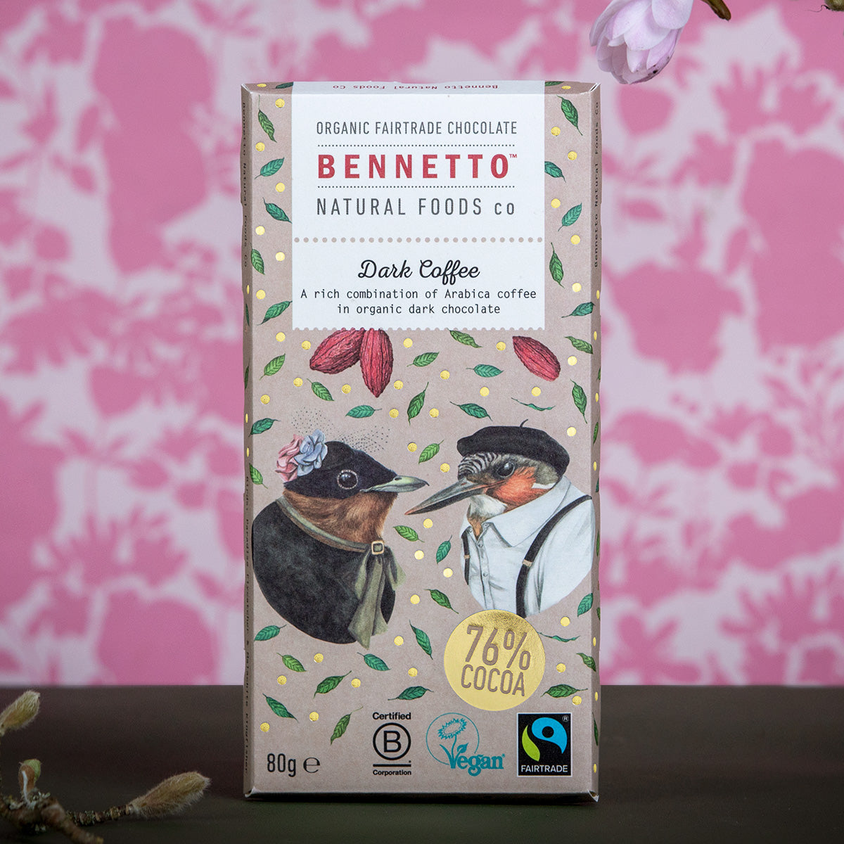Bennetto Organic Fairtrade Chocolate bar packaging with birds illustration on a pink floral background
