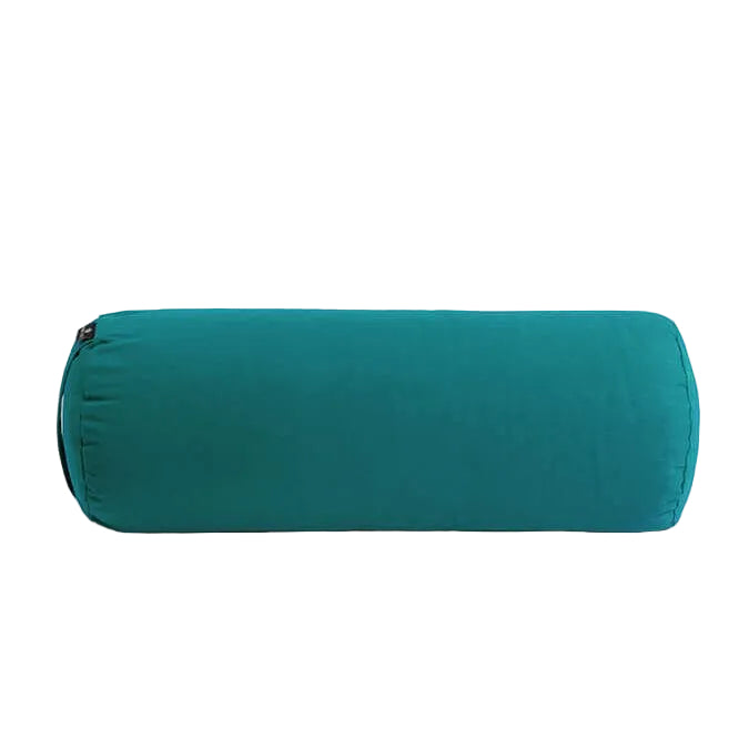 Teal yoga bolster on a light gray background