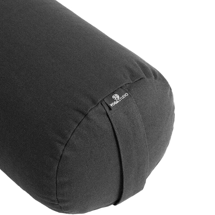 Black yoga bolster with a brand logo on a white background