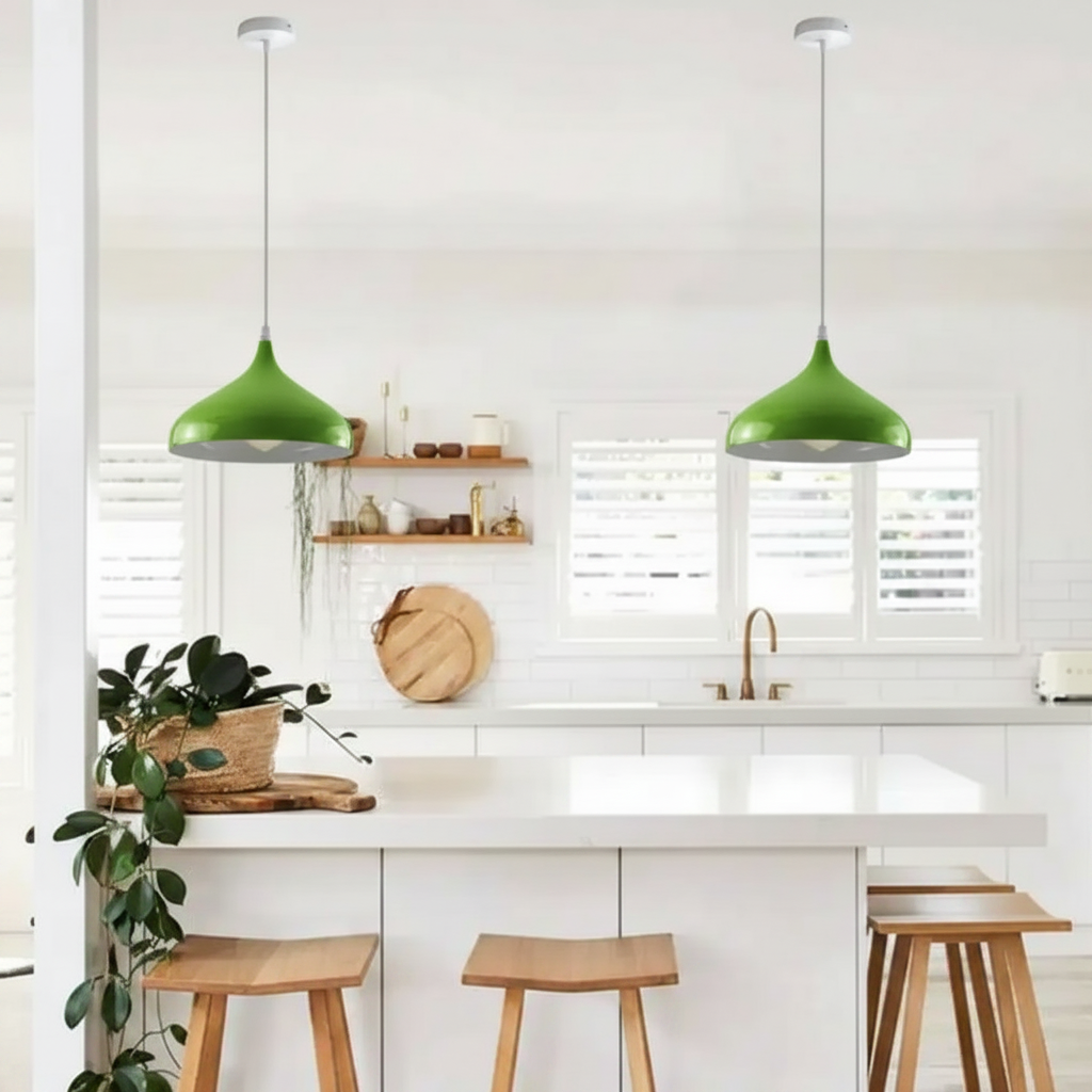 Green Retro Industrial Metal Dome Lampshade hanging in a bright modern white kitchen with wooden bar stools and green plants