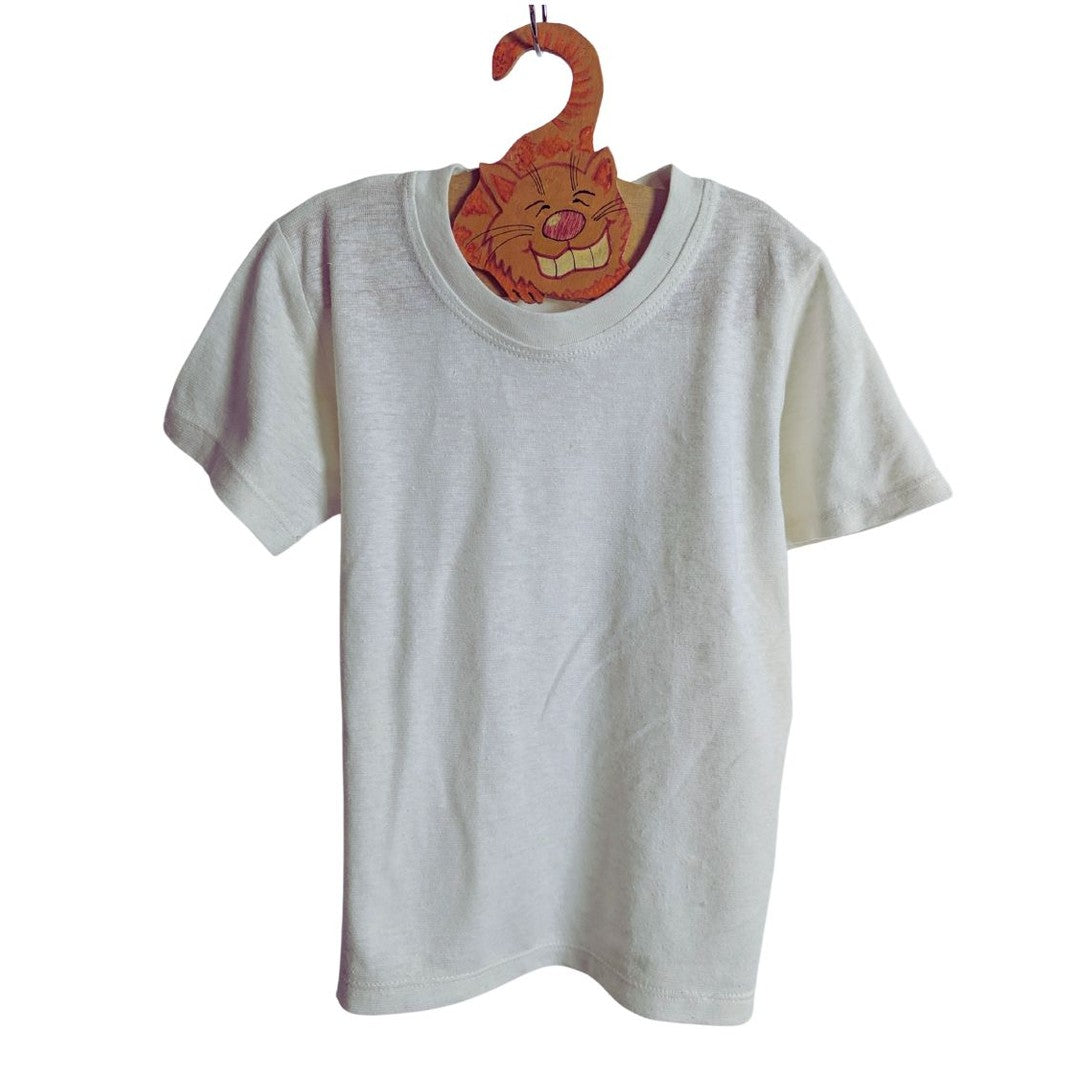 White t-shirt on a hanger with a cartoon character design.