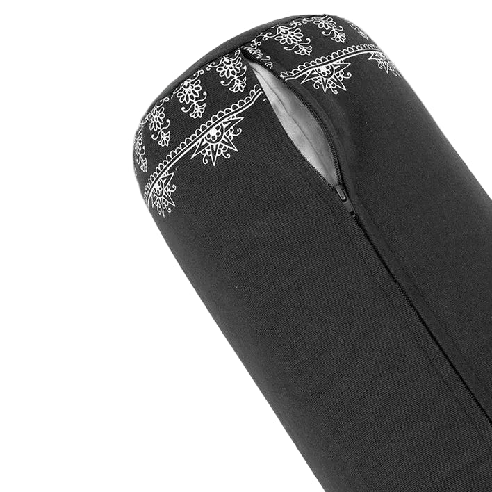 Black yoga bolster with white patterns on a white background