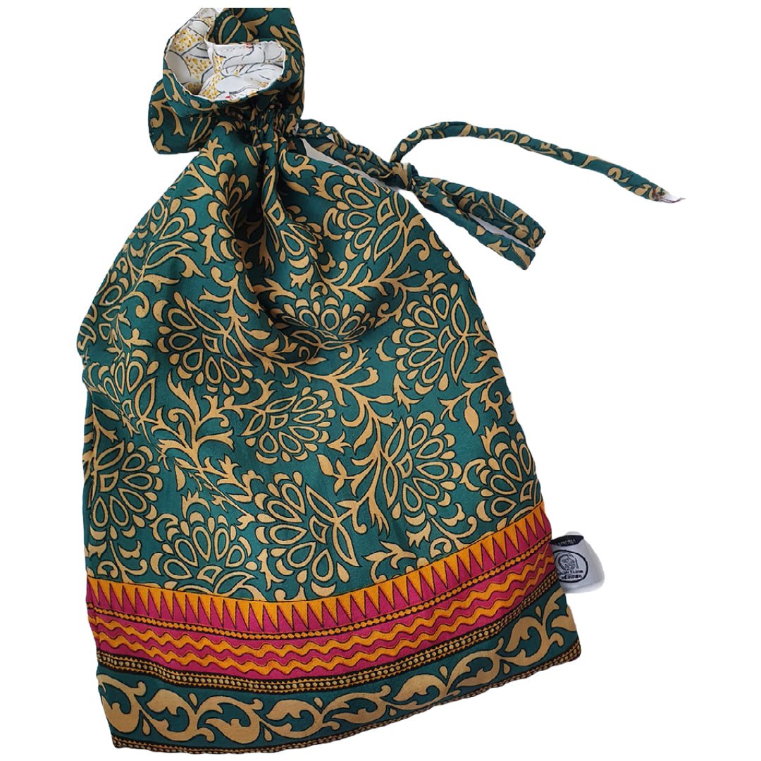 Decorative drawstring bag with intricate patterns on a white background