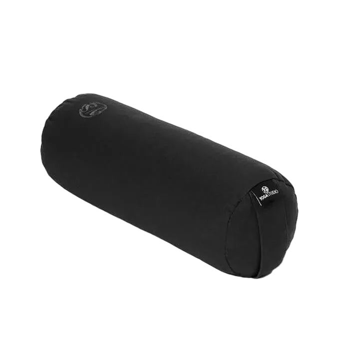 A cylindrical fabric yoga bolster pillow in Black, featuring a small embroidered logo on the side, set against a plain white background.
