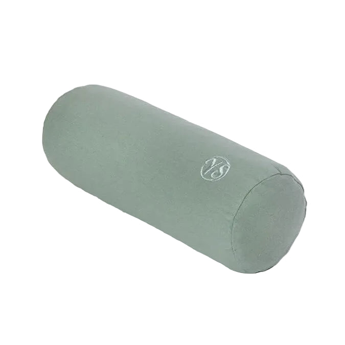 A sage green cylindrical yoga bolster pillow with a small white logo, shown on a plain white background.