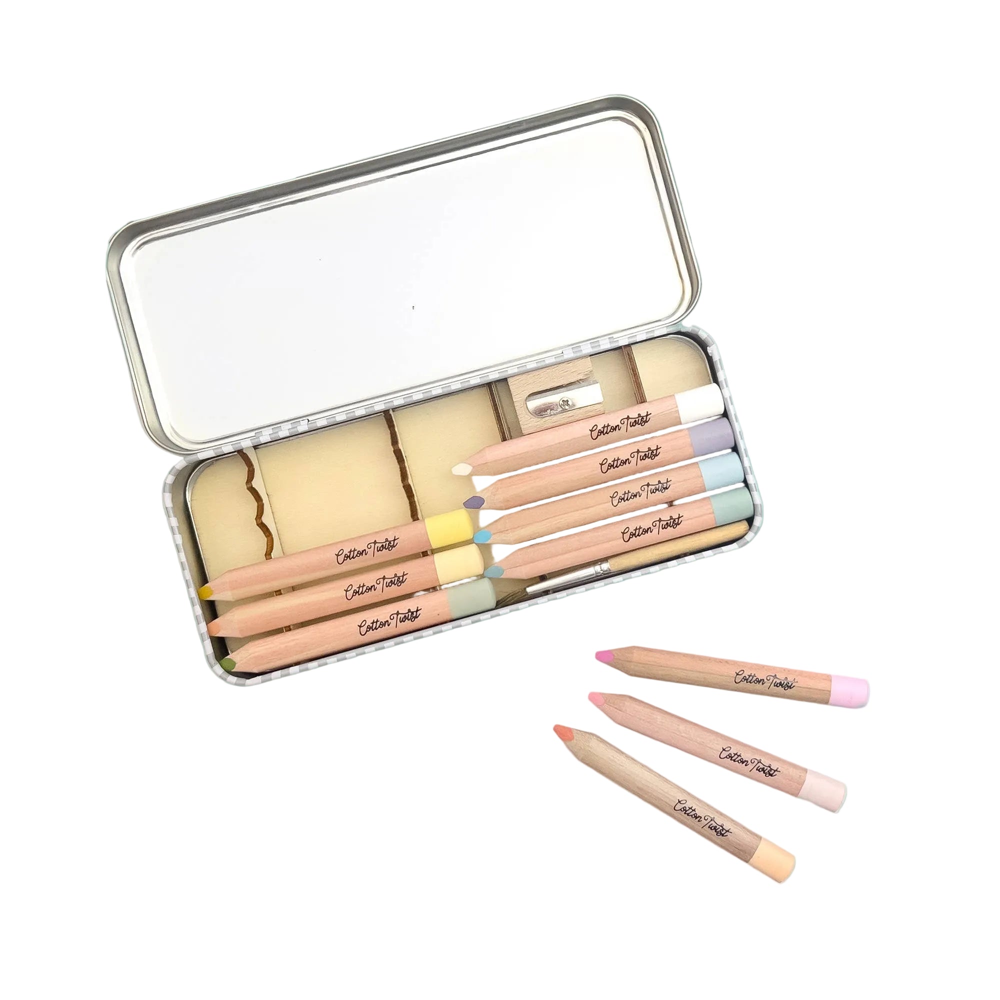 Set of watercolour pencils in a metal case on a teal background
