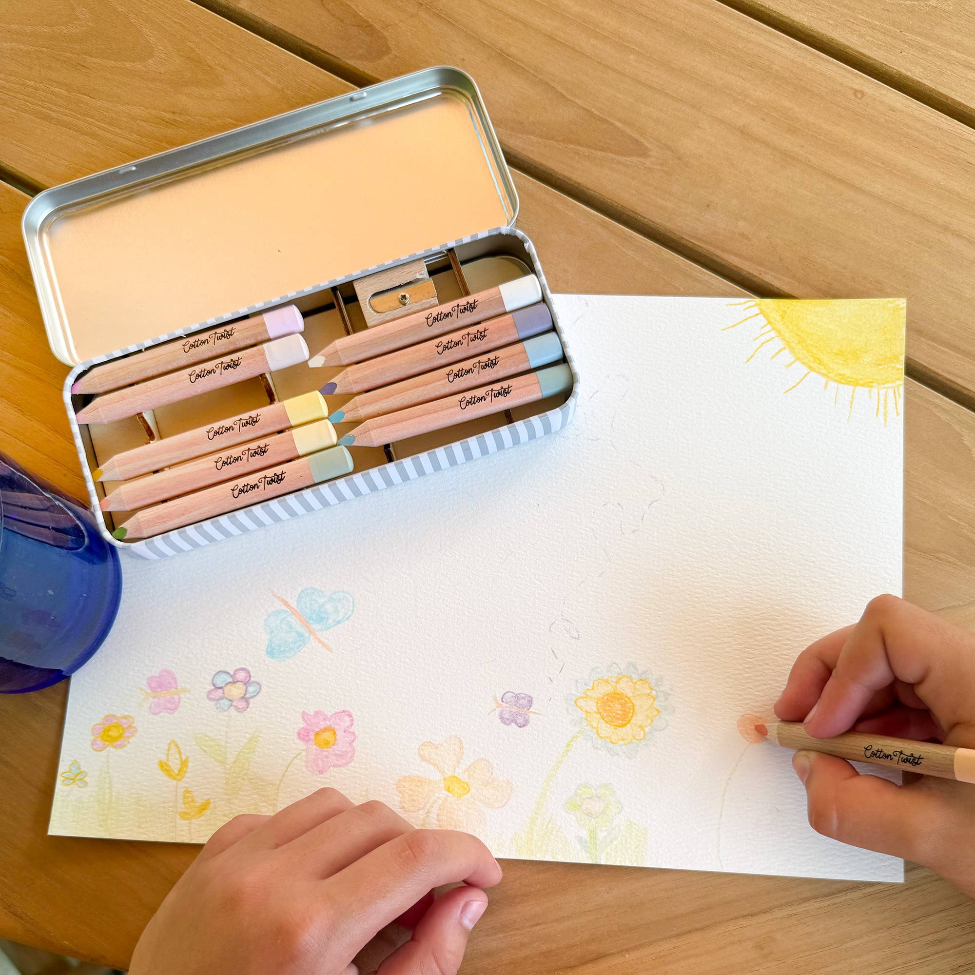 Set of eco-friendly watercolour pencils in a metal case
