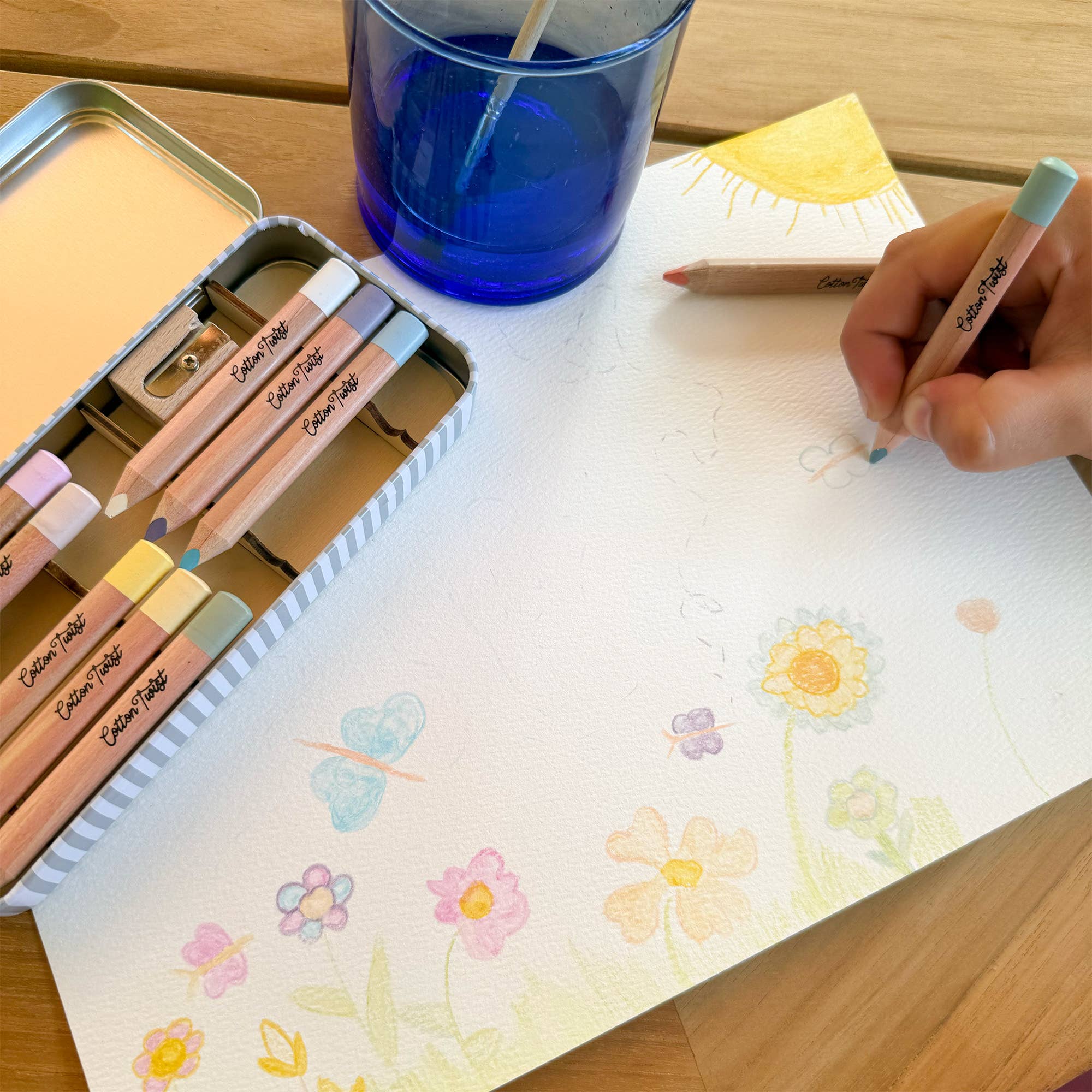 Set of eco-friendly watercolour pencils in a metal case