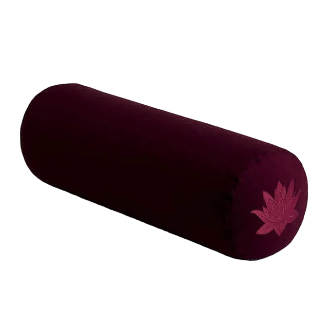 Maroon cylindrical yoga bolster with a pink lotus flower design on a light gray background