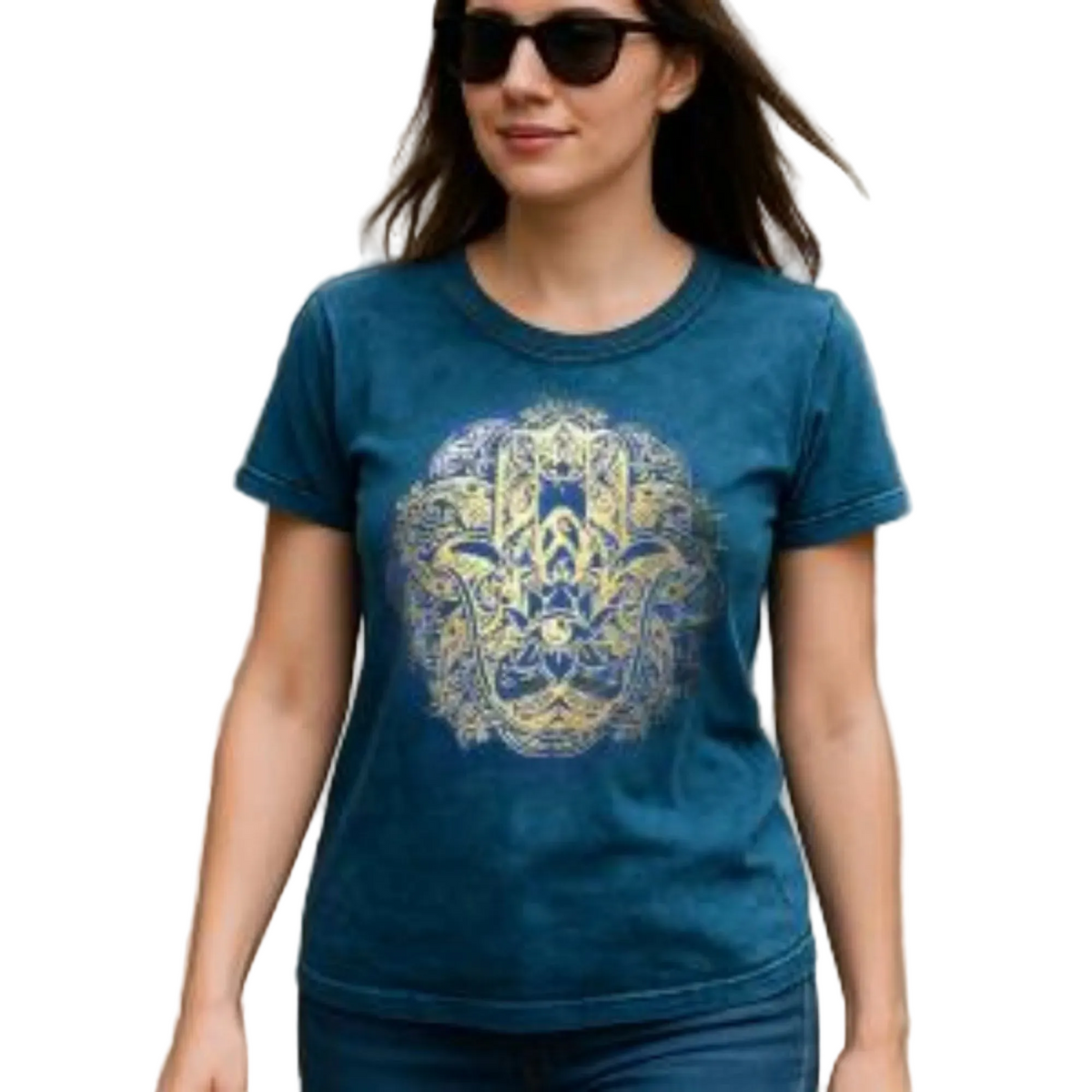 A woman wearing a teal blue short-sleeve t-shirt with a large gold and blue Hamsa hand graphic on the front, paired with dark sunglasses and blue jeans, set against a plain white background.