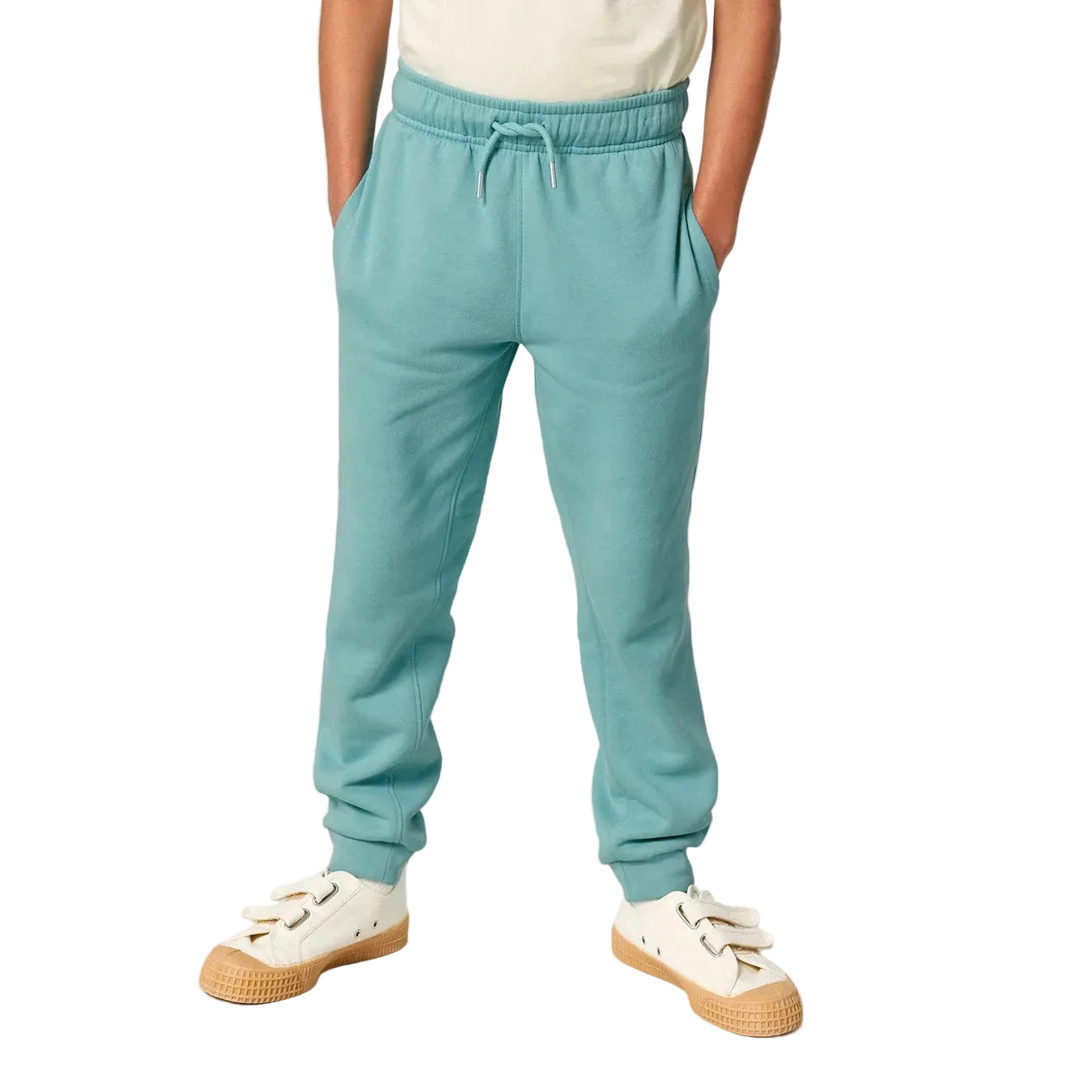 Teal sweatpants worn by a person on a white background