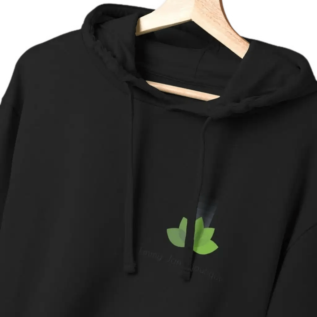 Black hoodie with a green logo on a hanger against a white background