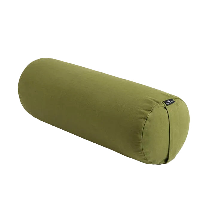 Green cylindrical yoga bolster on a white background