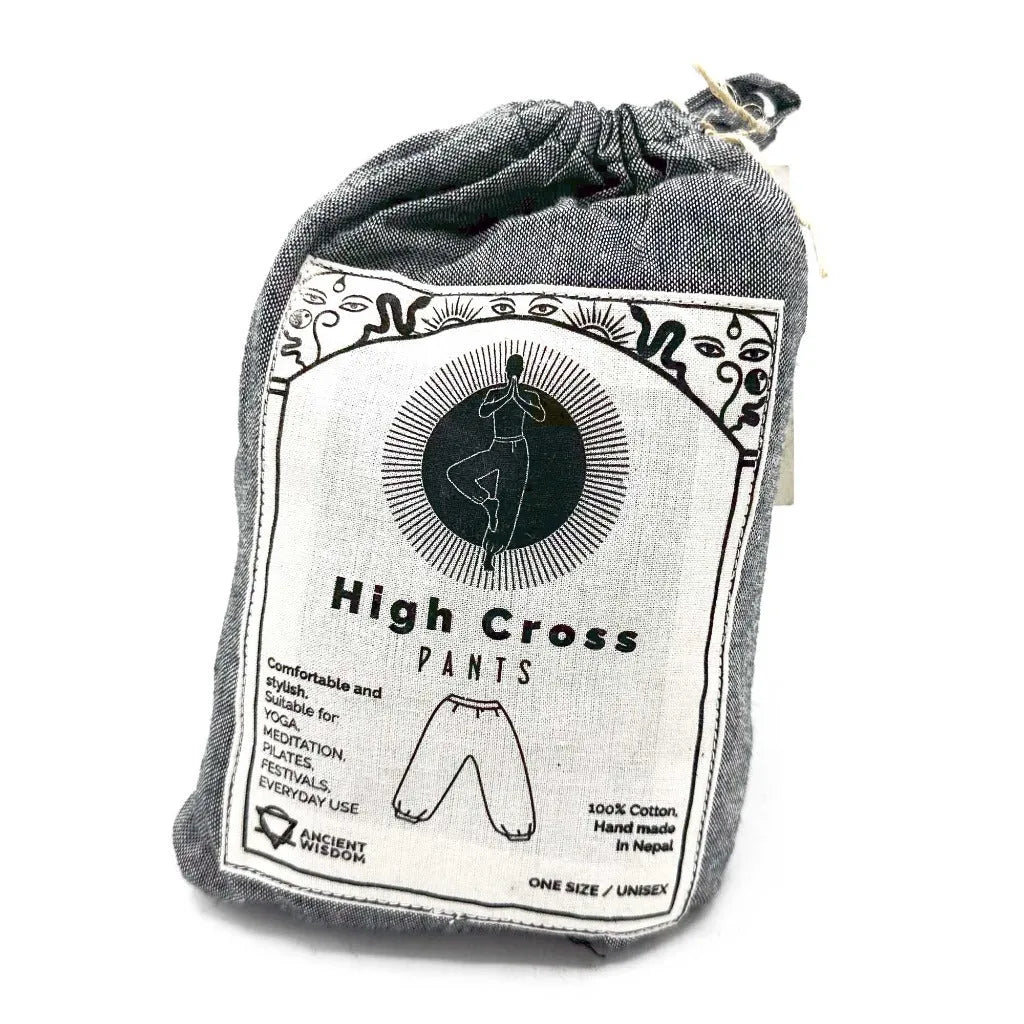 Packaged high cross yoga pants in a cotton pouch with a label on a white background
