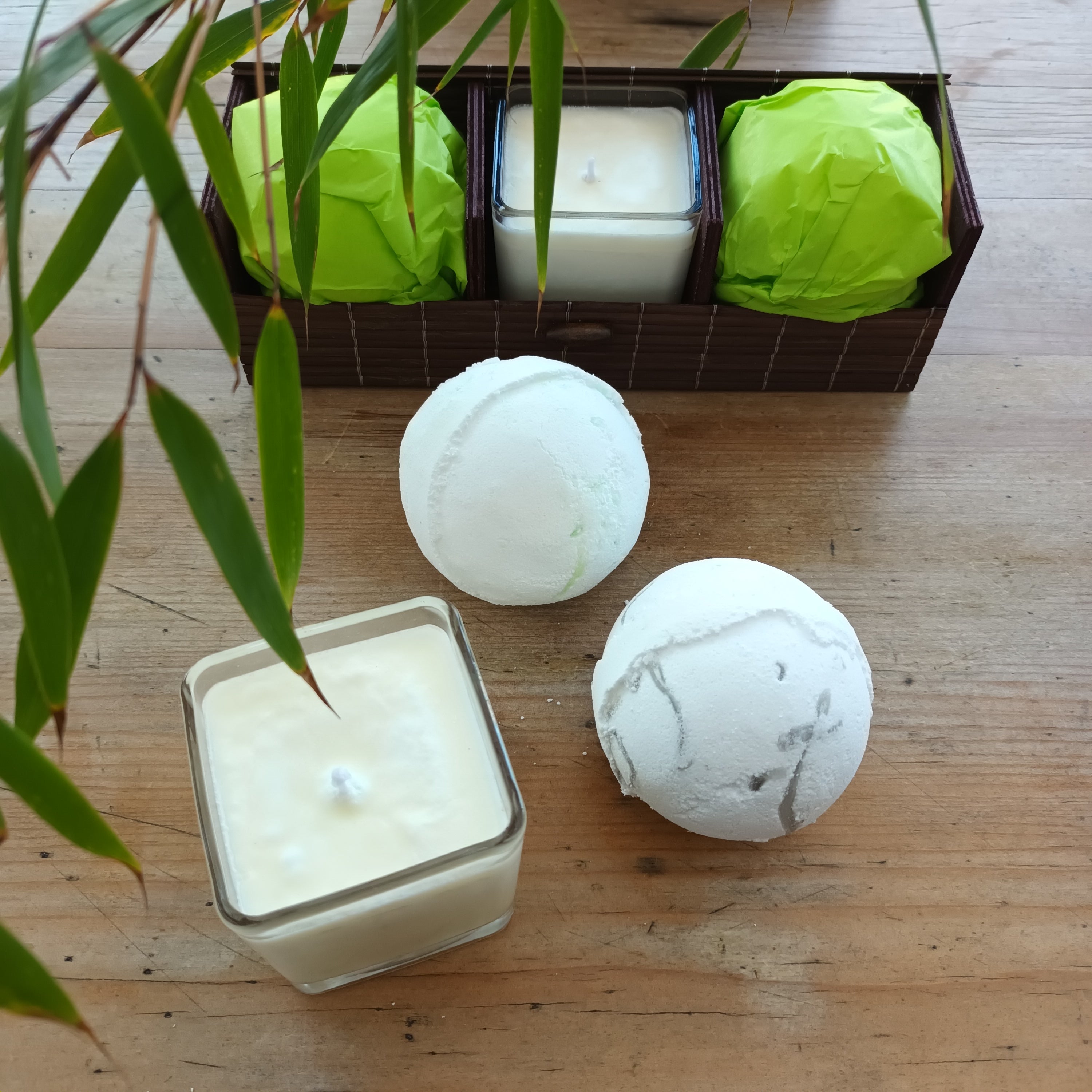 Natural bath products and candles with a bamboo plant