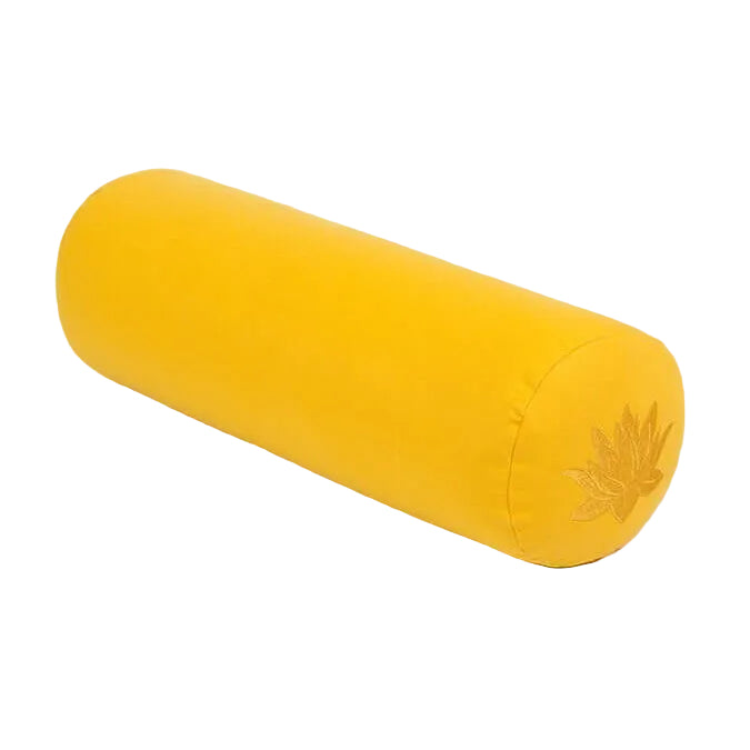 Yellow cylindrical pillow with a leaf design on a light gray background