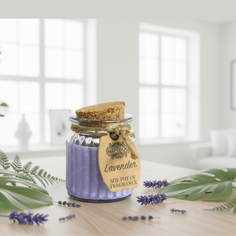 Jar of lavender candle with decorative elements on a wooden surface