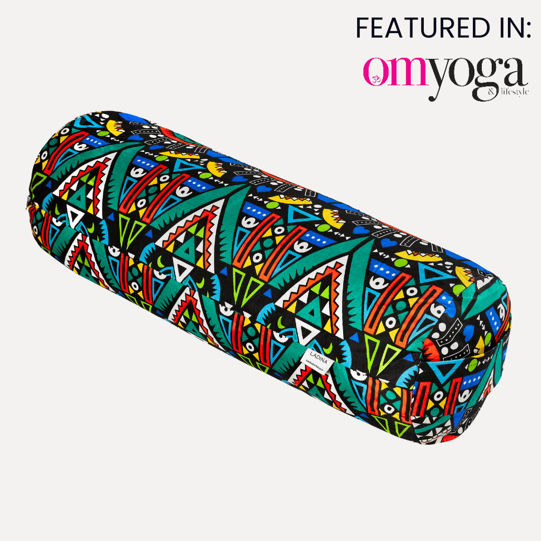 Colourful yoga block with geometric pattern on a white background, featuring 'Om Yoga' brand.