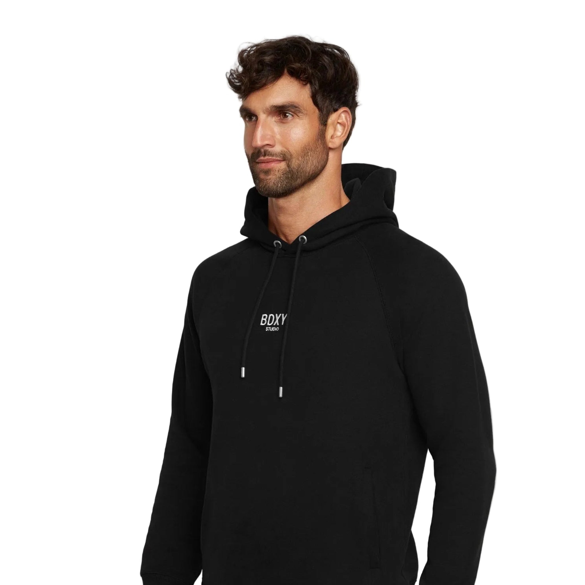 Man wearing a black hoodie with a brand logo on a white background