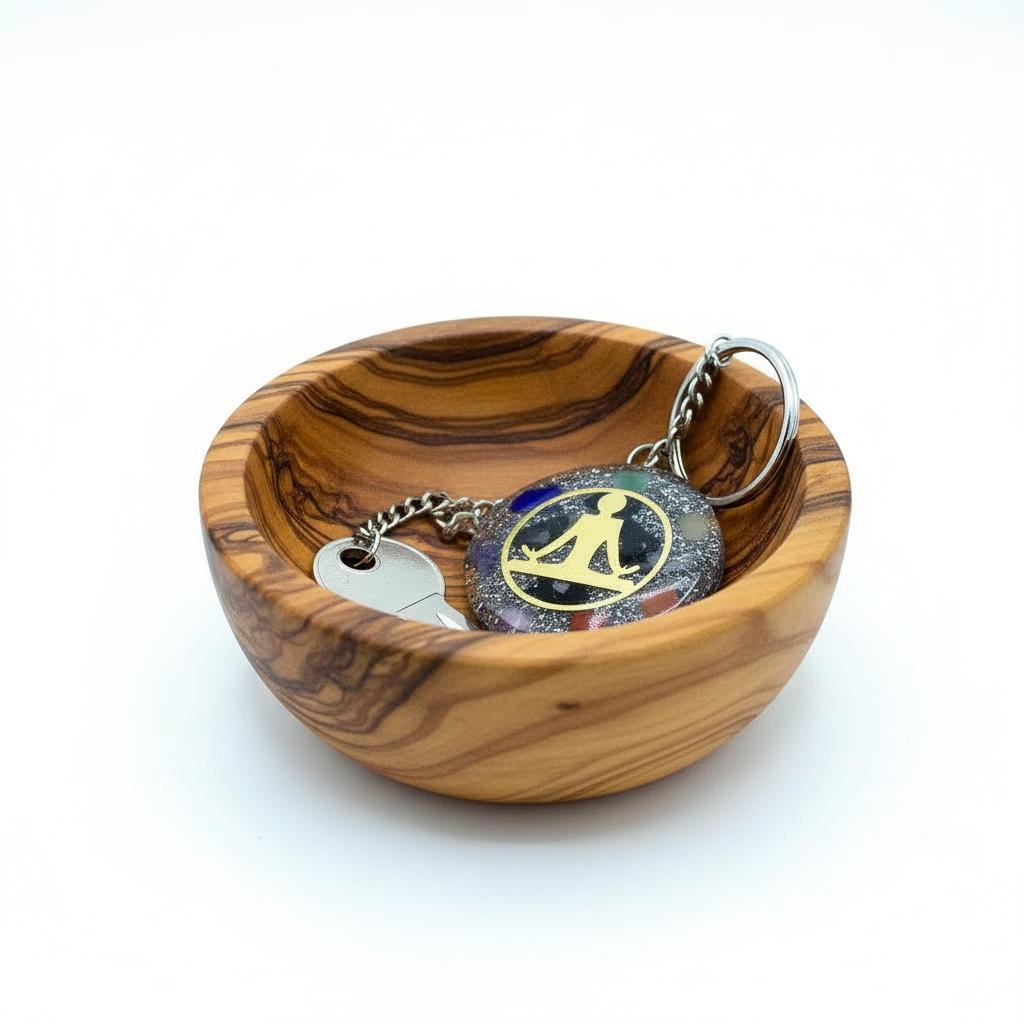 Wooden bowl with keychains on a white background