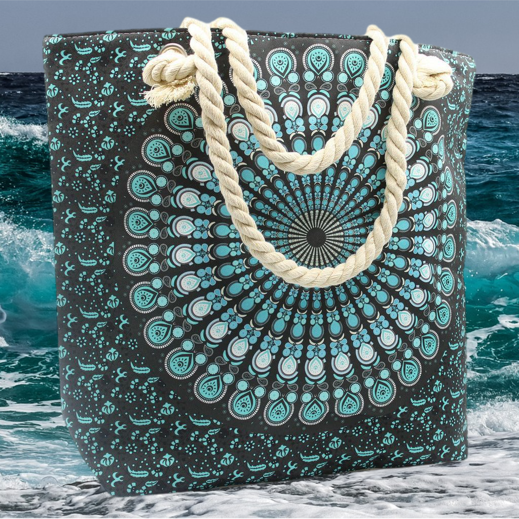 Emmy Jane - Large Beach Bag - Rope Handled Mandela Shopper Bag - Blue Shades. This charmingly patterned Mandala Bag is large enough for storing all of your essentials. This attractive bag has a small pocket inside, two shoulder straps, and a fastening at the top with a zip. Perfect for shopping and also for the beach.