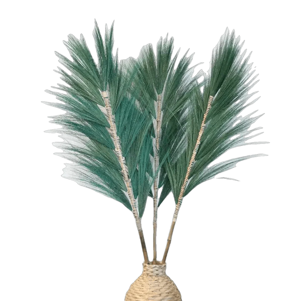 Dried pamas grass with textured beige stems arranged in a round woven beige vase, isolated on a white background.
