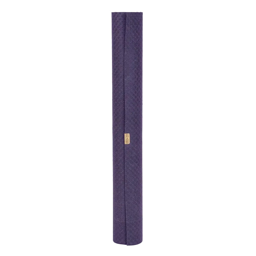 Purple textured eco yoga mat with a gold tag on a white background